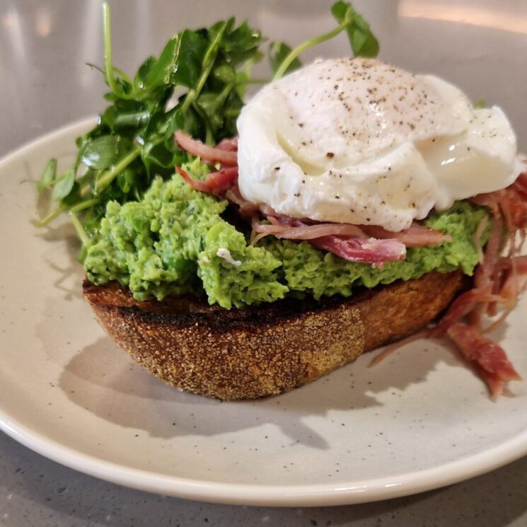 Peas on Toast with hamhock and poached egg
